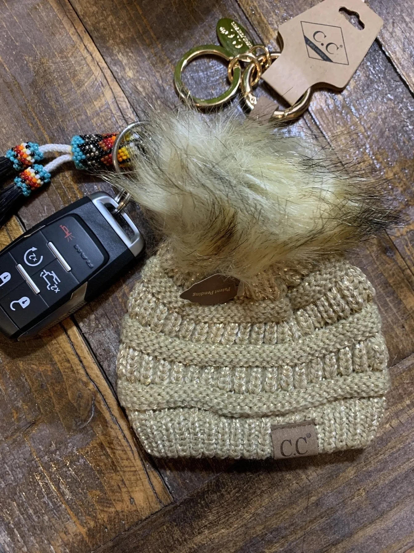 Gold CC beanie hat keychain